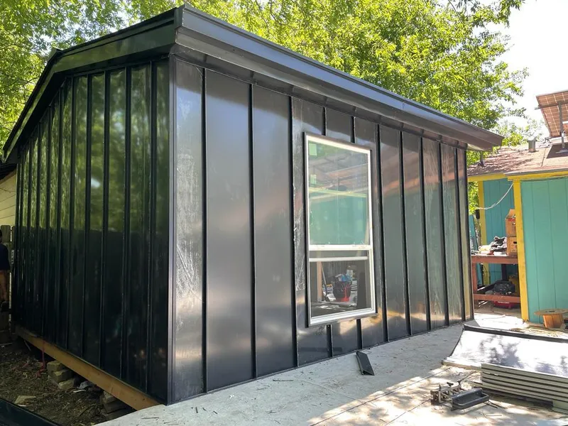 Black standing seam metal wall panels for Roof Inspection in Allen Park