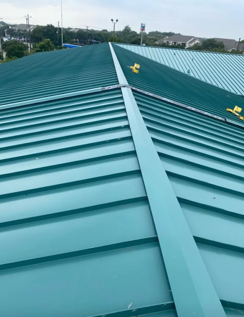 Green commercial metal roof ridge and valley for Metal Roof Repair in Allen Park