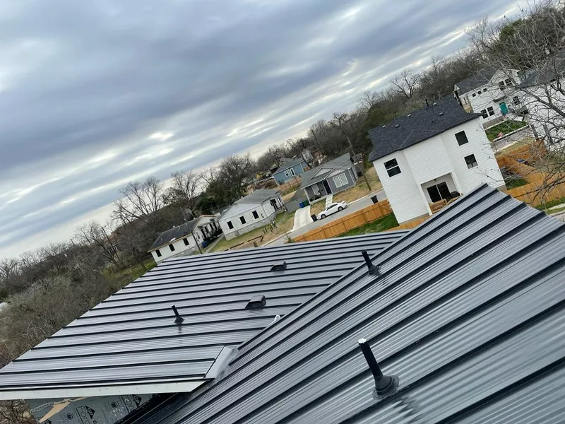 Standing seam metal roof panels with vents for Skylight Repair in Allen Park